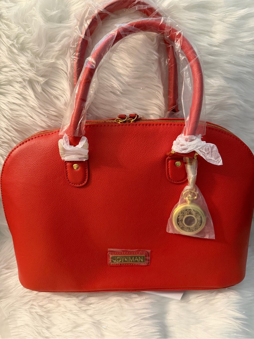 Joy & Iman Orange Dome Satchel with Gold Watch Charm